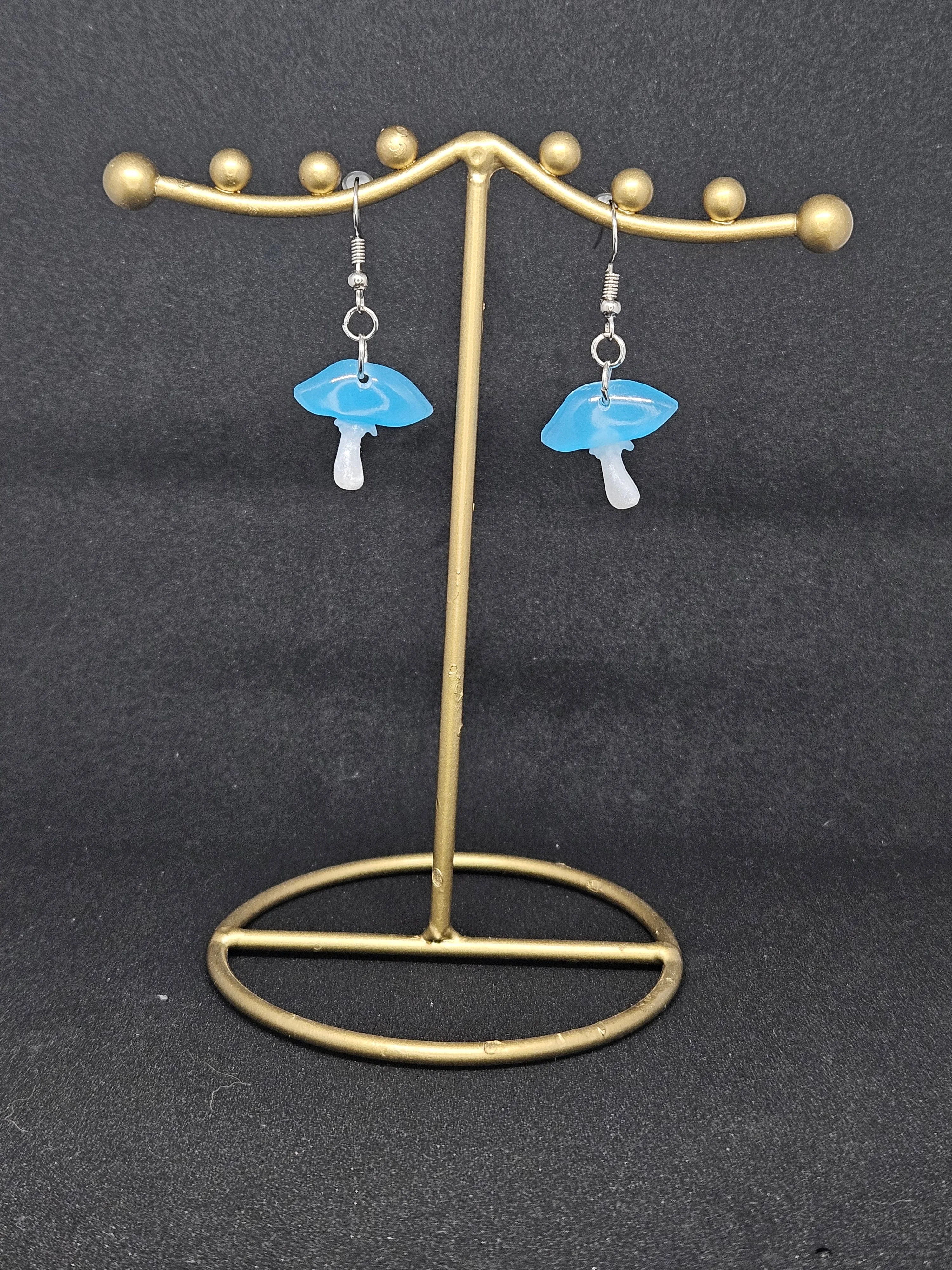 Mini blue glow-in-the-dark mushroom earrings